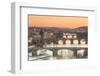 Orange sky at sunset on the historical bridges and buildings reflected on Vltava River, Prague, Cze-Roberto Moiola-Framed Photographic Print