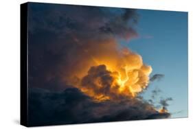 Orange Streak of Light Pierces Dramatic Cloud Formation-Sheila Haddad-Stretched Canvas