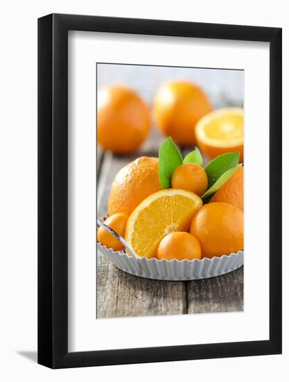 Oranges and Tangerines in a Bowl on Old Wood-Jana Ihle-Framed Photographic Print