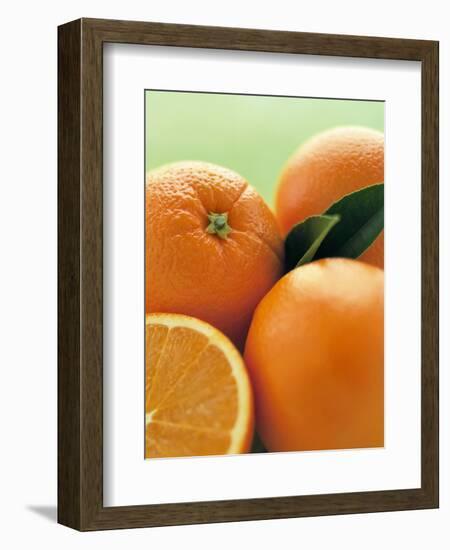 Oranges with Leaves Close Up-Leigh Beisch-Framed Photographic Print