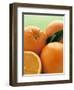 Oranges with Leaves Close Up-Leigh Beisch-Framed Photographic Print