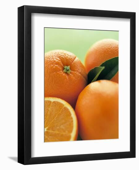 Oranges with Leaves Close Up-Leigh Beisch-Framed Photographic Print