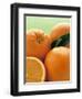 Oranges with Leaves Close Up-Leigh Beisch-Framed Photographic Print