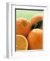 Oranges with Leaves Close Up-Leigh Beisch-Framed Photographic Print