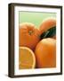 Oranges with Leaves Close Up-Leigh Beisch-Framed Photographic Print