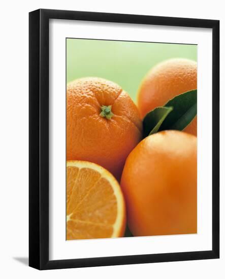 Oranges with Leaves Close Up-Leigh Beisch-Framed Photographic Print