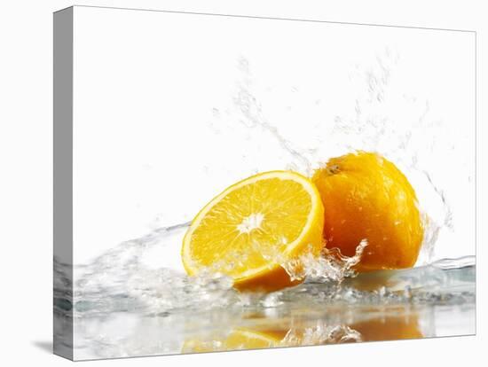 Oranges with Splashing Water-Michael L?ffler-Stretched Canvas