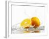 Oranges with Splashing Water-Michael L?ffler-Framed Photographic Print