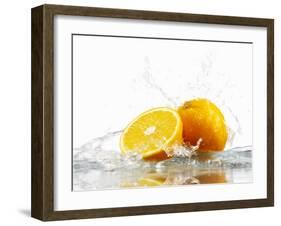 Oranges with Splashing Water-Michael L?ffler-Framed Photographic Print