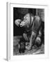 Orangutan Takes His Daily Medicine-null-Framed Premium Photographic Print