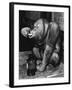 Orangutan Takes His Daily Medicine-null-Framed Premium Photographic Print