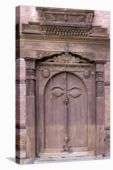Orate Wooden Door in the Hanuman Dhoka Royal Palace Complex, Kathmandu, Nepal, Asia-John Woodworth-Stretched Canvas