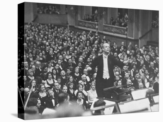 Orchestra Conductor Wilhelm Furtwangler Conducting Orchestra During a Concert-Alfred Eisenstaedt-Stretched Canvas