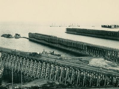 https://imgc.allpostersimages.com/img/posters/ore-docks-on-lake-superior-marquette-michigan-1890s_u-L-Q1J4UTM0.jpg?artPerspective=n