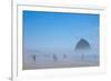 Oregon, Cannon Beach. Haystack Rock, beachgoers in fog-Jamie and Judy Wild-Framed Photographic Print