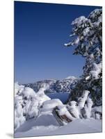 Oregon, Crater Lake National Park. Winter snow accumulates at Crater Lake-John Barger-Mounted Photographic Print