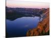 Oregon. Crater Lake NP, sunrise light on Wizard Island, view south from Merriam Point-John Barger-Stretched Canvas