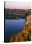 Oregon. Crater Lake NP, sunrise light on Wizard Island, view south from Merriam Point-John Barger-Stretched Canvas