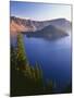 Oregon, Crater Lake NP. Sunrise on west rim of Crater Lake with Wizard Island and distant Llao Rock-John Barger-Mounted Photographic Print