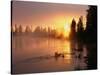 Oregon. Deschutes National Forest, rising sun breaks through morning fog along the Deschutes River.-John Barger-Stretched Canvas