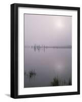 Oregon. Deschutes NF, early morning sun breaks through fog over Crane Prairie Reservoir.-John Barger-Framed Photographic Print