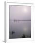 Oregon. Deschutes NF, early morning sun breaks through fog over Crane Prairie Reservoir.-John Barger-Framed Photographic Print