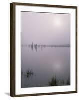 Oregon. Deschutes NF, early morning sun breaks through fog over Crane Prairie Reservoir.-John Barger-Framed Photographic Print