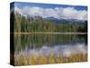 Oregon, Willamette NF. Scott Lake in autumn with the Three Sisters partially obscured by clouds.-John Barger-Stretched Canvas