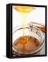 Organic Honey Running into a Honey Jar-Paul Blundell-Framed Stretched Canvas