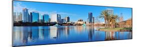 Orlando Lake Eola in the Morning with Urban Skyscrapers and Clear Blue Sky.-Songquan Deng-Mounted Photographic Print