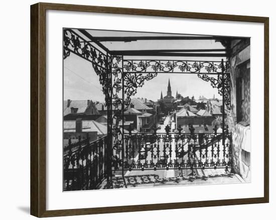 Orleans Street, Center of Old French Quarter of City, Through Grillwork of a Balcony-Andreas Feininger-Framed Photographic Print