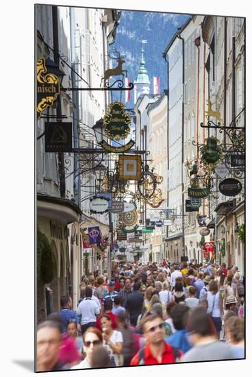 Ornate Shop Signs on Getreidegasse, Salzburgs Bustling Shopping Street, Salzburg-Doug Pearson-Mounted Photographic Print