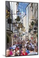 Ornate Shop Signs on Getreidegasse, Salzburgs Bustling Shopping Street, Salzburg-Doug Pearson-Mounted Photographic Print