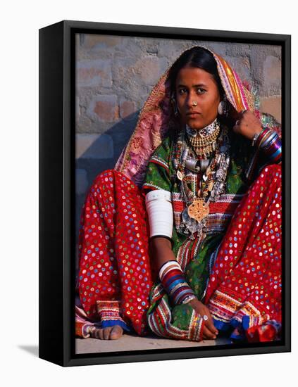 Ornately Dressed Megwar Tribe Woman Sits Next to Wall, Gujurat, India-Jaynes Gallery-Framed Stretched Canvas