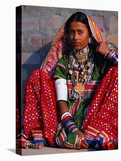 Ornately Dressed Megwar Tribe Woman Sits Next to Wall, Gujurat, India-Jaynes Gallery-Stretched Canvas