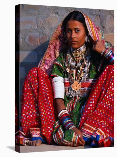 Ornately Dressed Megwar Tribe Woman Sits Next to Wall, Gujurat, India-Jaynes Gallery-Stretched Canvas