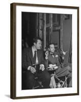 Orson Welles and Cole Porter Discussing the Stage Production of "Around the World in 80 Days"-Al Fenn-Framed Premium Photographic Print