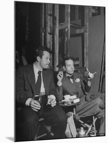Orson Welles and Cole Porter Discussing the Stage Production of "Around the World in 80 Days"-Al Fenn-Mounted Premium Photographic Print
