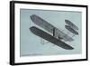 Orville Wright in Biplane-null-Framed Art Print