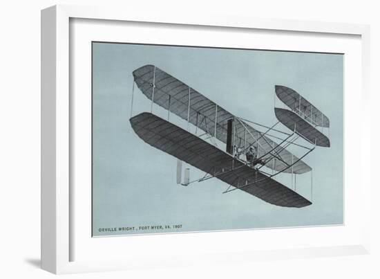 Orville Wright in Biplane-null-Framed Art Print