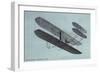 Orville Wright in Biplane-null-Framed Art Print