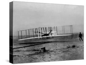 Orville Wright Taking Plane For 1st Motorized Flight as Brother Wilbur Wright Looks at Kitty Hawk-null-Stretched Canvas