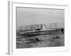 Orville Wright Taking Plane For 1st Motorized Flight as Brother Wilbur Wright Looks at Kitty Hawk-null-Framed Photographic Print