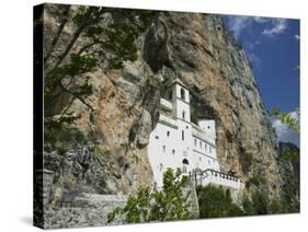 Ostrog Monastery Built into Mountain, Montenegro-Walter Bibikow-Stretched Canvas