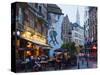 Outdoor Cafes and Brousaille Wall Mural of a Couple Walking Arm in Arm, Brussels, Belgium, Europe-Christian Kober-Stretched Canvas