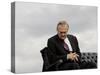 Outgoing Secretary of Defense Donald Rumsfeld Looks Down as He Sits on Stage-Pablo Martinez Monsivais-Stretched Canvas