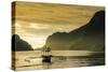 Outrigger at Sunset in the Bay of El Nido, Bacuit Archipelago, Palawan, Philippines-Michael Runkel-Stretched Canvas