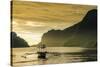 Outrigger at Sunset in the Bay of El Nido, Bacuit Archipelago, Palawan, Philippines-Michael Runkel-Stretched Canvas