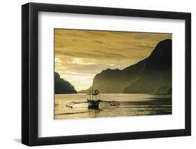 Outrigger at Sunset in the Bay of El Nido, Bacuit Archipelago, Palawan, Philippines-Michael Runkel-Framed Photographic Print