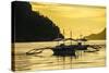 Outrigger at Sunset in the Bay of El Nido, Bacuit Archipelago, Palawan, Philippines-Michael Runkel-Stretched Canvas